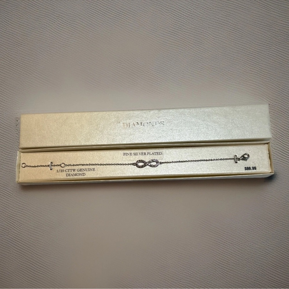 Fine Silver Plated 1/10CTTW Genuine Diamond Infinity Bracelet